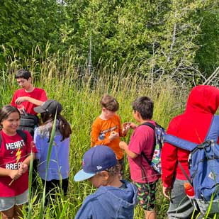 Sheg-stories-youth-taking-part-in-the-medicine-walk-with-Jake-Agoneh